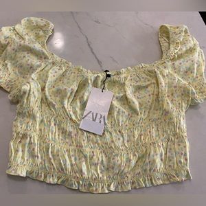 Light yellow Zara off-the shoulder crop blouse with flowers